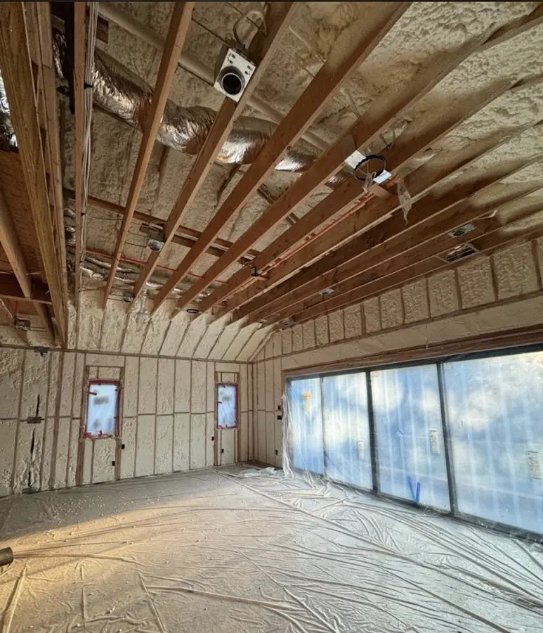 Interior walls and ceiling insulated with spray foam during new construction in Bossier City